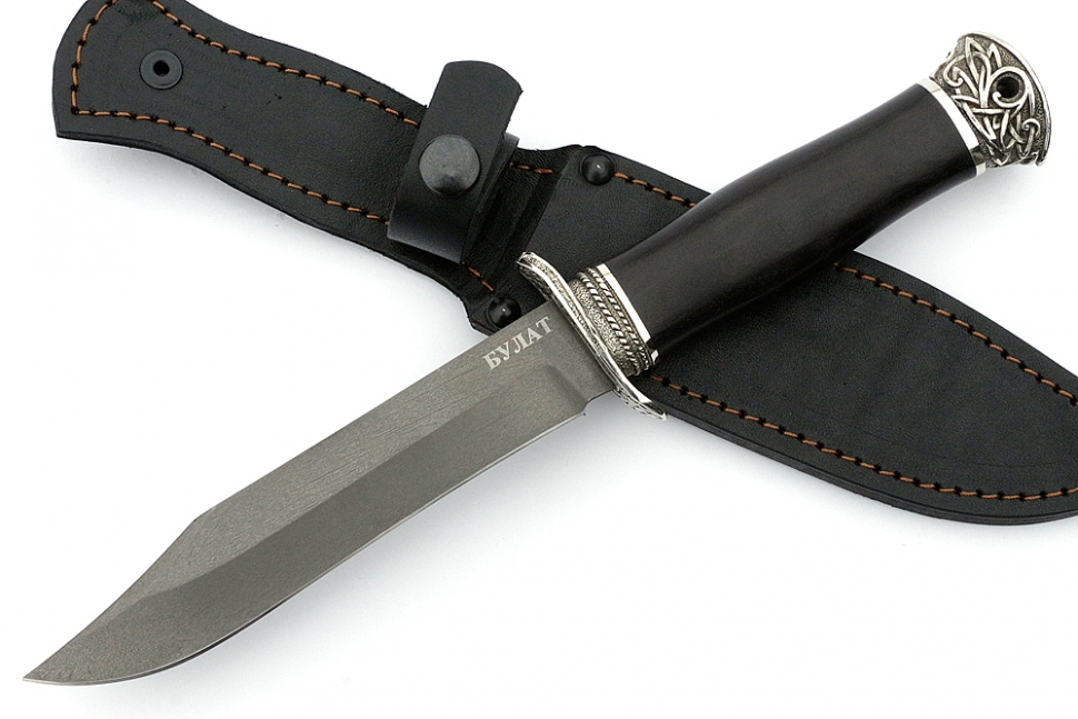 Нож Гладиатор (булат, чёрный граб - мельхиор) на кованой подставке с подсвечником